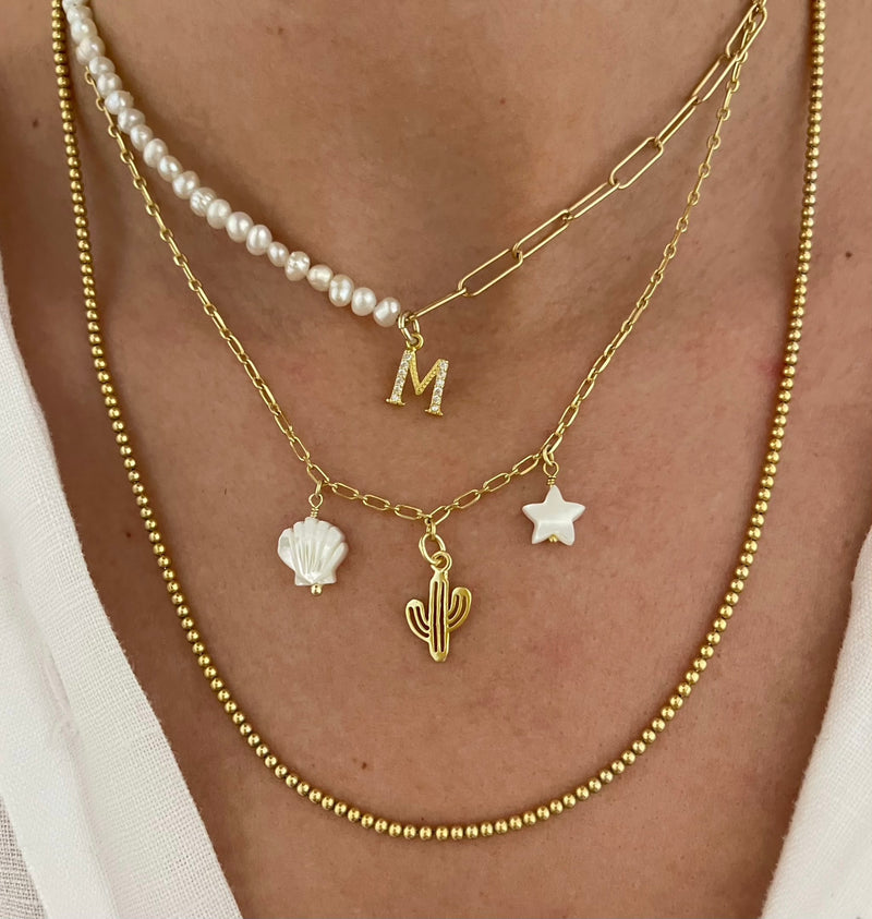 Charm Nácar Star Gold